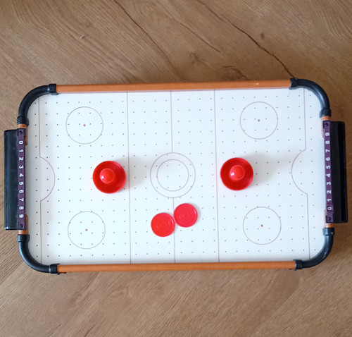 Working tabletop air hockey - air,
